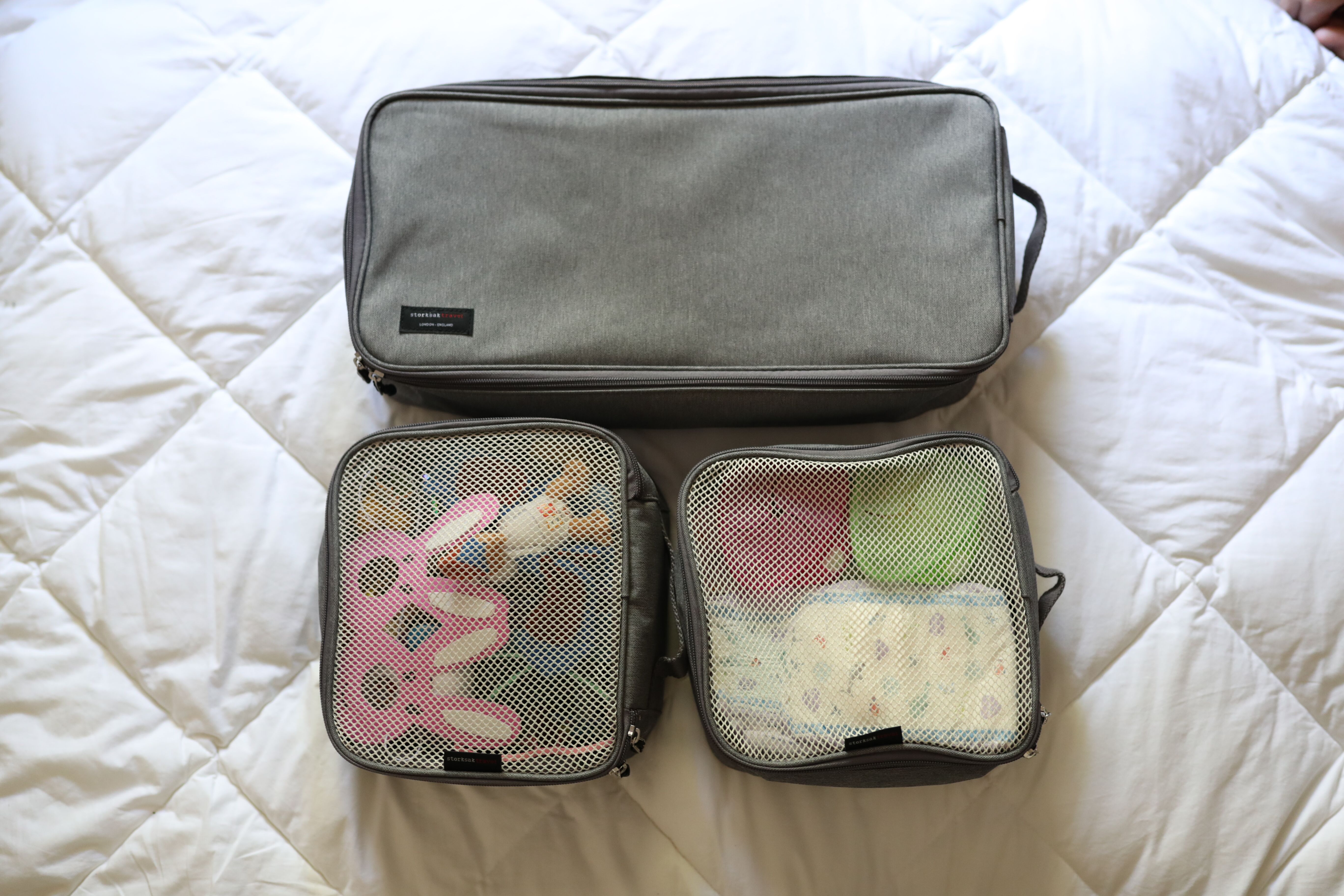 After thirty flights with our twenty-mouth-old twins, we've refined our travelling process and are finally ready to reveal our secrets.